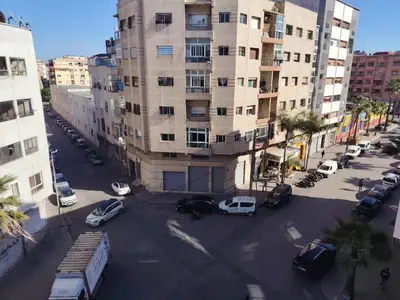 an aerial view of a parking lot in front of a building at fabulous Casablanca in Casablanca