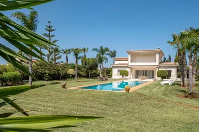 an image of a house with a swimming pool at Superb Villa in Bouznika with Private Pool & Hammam in Bouznika