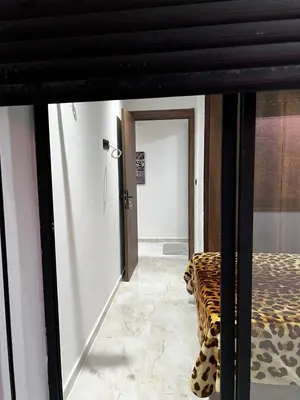 a view of a room with a leopard print couch at Skyline Urban - by Nero in Casablanca
