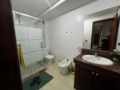 a bathroom with a sink and a toilet and a mirror at Pure Space - by Nero in Casablanca