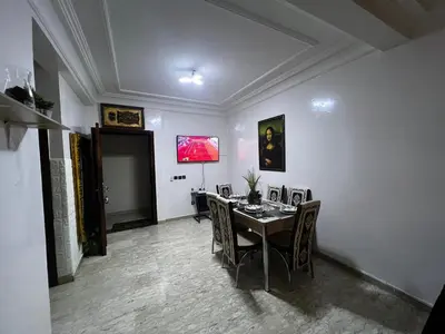 a dining room with a table and chairs at Pure Space - by Nero in Casablanca