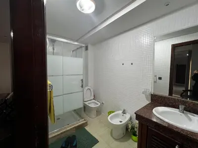a bathroom with a sink and a toilet and a mirror at Pure Space - by Nero in Casablanca