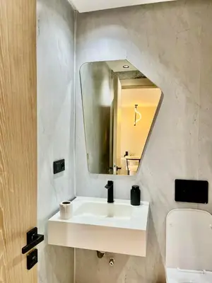 a bathroom with a white sink and a mirror at Bat infinity living in Casablanca
