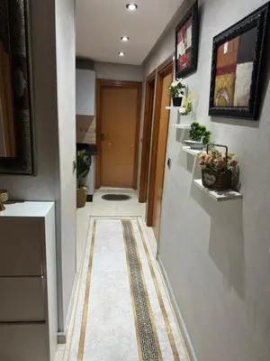 a hallway with at appart 206 in Temara
