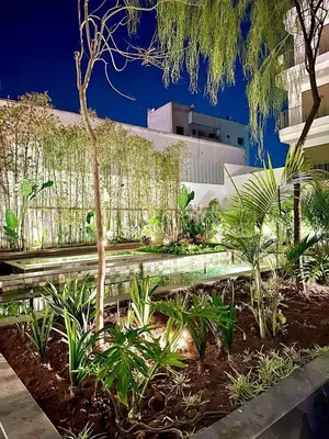 a park bench in front of a building at Charming studio located in Tadart in Casablanca