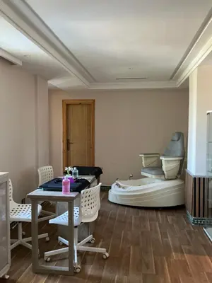 a room with a table and a large inflatable room at Palm Palace Bouznika in Bouznika