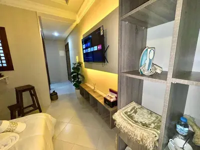 a room with a bed and a tv in it at cosy studio au cœur de rabat agdal in Rabat