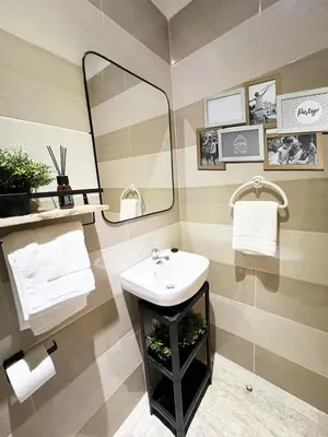 a bathroom with a sink and a mirror at Ocean view & sunset in the heart of Rabat 2 in Rabat