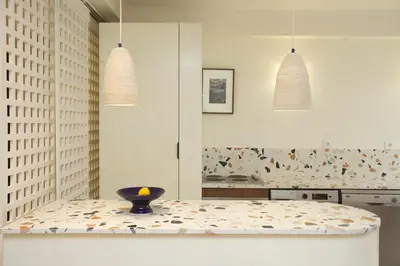 a kitchen with a table with a bowl on it at Cozy apartment 5 minutes from Casa Voyageurs in Casablanca