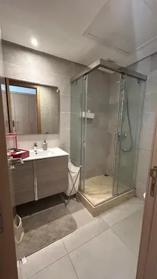 a bathroom with a shower and a sink at Modern and cozy accommodation in Rabat in Rabat