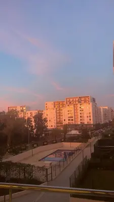 a view of a city with buildings and a pool at Modern and cozy accommodation in Rabat in Rabat