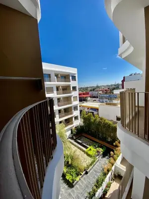 a view from the balcony of a building at Très beau appartement a tadart au centre de casablanca in Casablanca