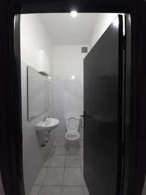 a bathroom with a toilet and a sink at Faridi house in Casablanca