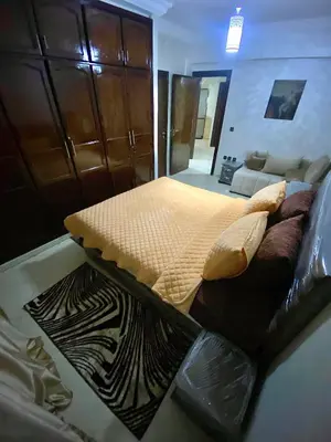 a bedroom with a large bed in a room at casa bella in Casablanca