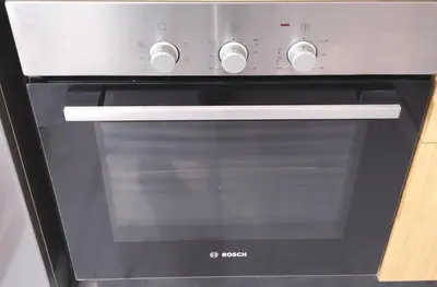 a black oven with a glass door in a kitchen at Your comfortable stopover in Nouaseur