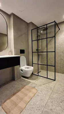 a bathroom with a toilet and a sink and a shower at Modern apartment in Casablanca in Casablanca