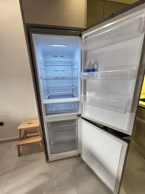 an empty refrigerator with its door open in a room at Résidence EDEN 4 - Casablanca Center in Casablanca