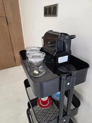 a coffee maker on a cart in a kitchen at Résidence EDEN 4 - Casablanca Center in Casablanca