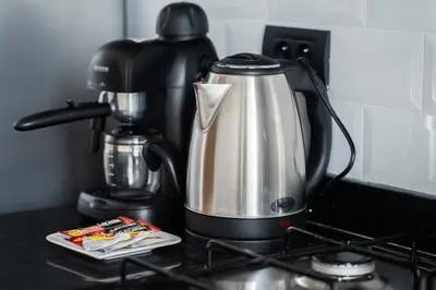a coffee pot sitting on top of a stove at Studio Raffiné et Lumineux in Casablanca