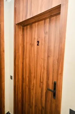 a wooden door with the number on it at Atelier Aedes - Studio 2 in Maarif