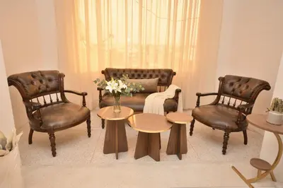 a living room with a couch and two chairs and a table at Abdelmoumen Central Spacious Haven in Maarif