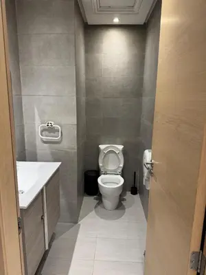 a bathroom with a toilet and a sink at Nice Studio rabat in Rabat