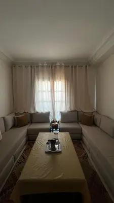 a living room with a couch and a coffee table at La maison in Casablanca