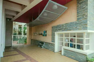 a living room with a fireplace and a stone wall at Home Stay Casa in Casablanca
