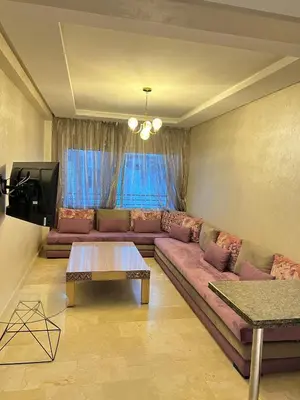 a living room with a couch and a table at Flora Nora - Central Tramway - by Mi-haven in Casablanca