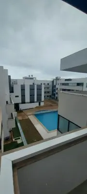 a view of a building with a swimming pool at Residence paradise beach el Mansoria in Mohammedia