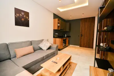 a living room with a couch and a coffee table at Atelier Aedes - Studio 1 in Maarif