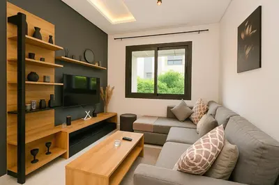 a living room with a couch and a table at Atelier Aedes - Studio 1 in Maarif