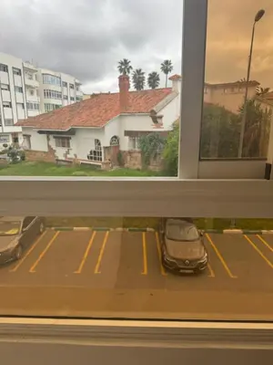 a view from a window of a parking lot at Appartement Sara in Mohammedia