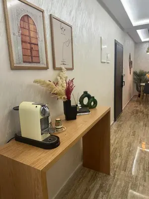 a room with a counter with a sewing machine on it at Cosy Stay 15min from Casablanca Airport, in Berrechid in Berrechid