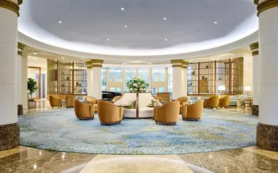 a large lobby with a table and chairs in it at fresh in Casablanca
