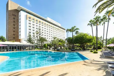 a swimming pool in front of a hotel at fresh in Casablanca