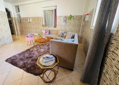 a living room with a couch and a table at Le belvédère in Casablanca