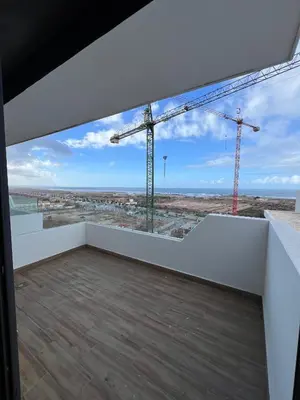 a view from a building under construction with cranes at Ocean park zenata in Aïn Harrouda