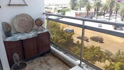 a balcony with a view of a street at Bel appartement in Mohammedia