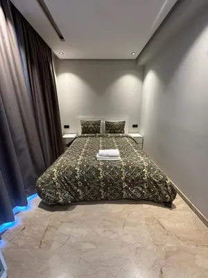 a bedroom with a large bed in a room at chic escape in Casablanca