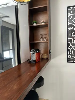 a room with a wooden desk with a toaster on it at chic escape in Casablanca