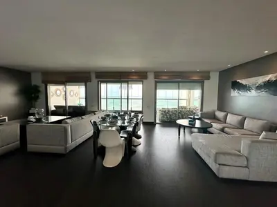 a living room with couches and a table and chairs at 360 Sea View - Marina - Spacious 3 BR Retreat in Casablanca