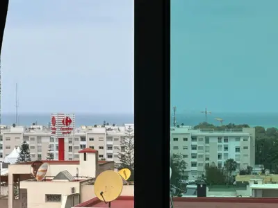a view of a city from a window at Signorina appartamento in Temara