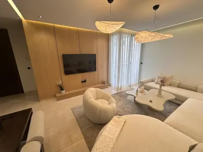 a living room with a couch and a table at Comfortable & Central Casablanca Apartment in Casablanca