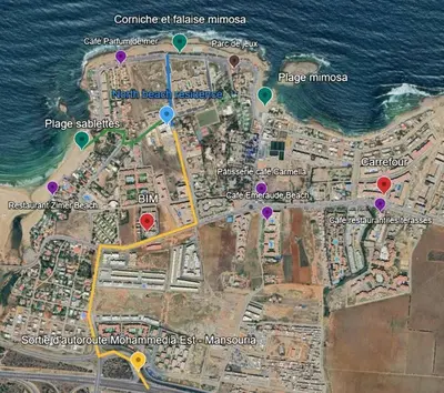a map of a beach with purple and green dots at Évasion luxueuse avec piscine proche de la mer in Mohammedia