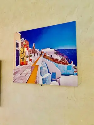 a picture of a town on a wall at logement entier familly house in Tamaris