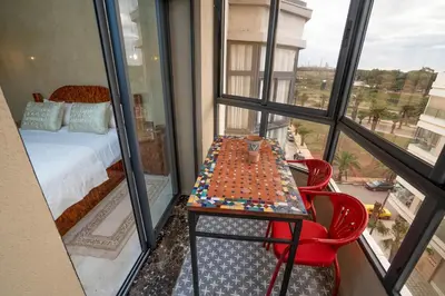 a table with legos on it in front of a window at Nafhat al arz - Moroccan and refined in Mohammedia