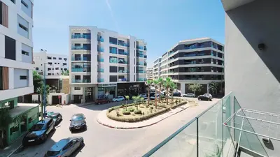 an aerial view of a parking lot in a city at Studio Cosy les Princesses in Casablanca