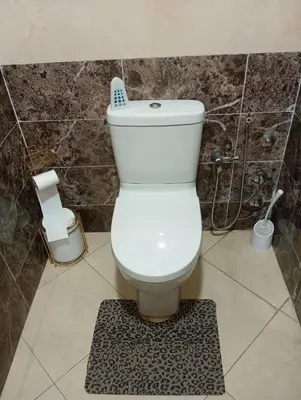 a bathroom with a white toilet in a room at Elegant apartment in Rabat in Rabat