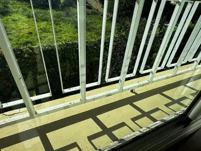 a window with a view of a garden outside at Villa in mohammadia morrocco in Mohammedia